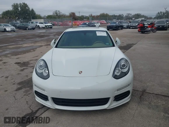 ✅ 2014 Porsche Panamera S E-Hybrid • VIN: WP0AD2A7XEL044254 • Lot: 44385771. Listed on IAAI with 131,235 mi. Free auction sales archive from the USA and detailed vehicle history report at DreamBid. Image 6.
