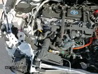 ✅ 2023 Toyota Corolla Hybrid SE • VIN: JTDBCMFE7P3015730 • Lot: 86508625. Wystawiony na Copart z przebiegiem 15 009 mil. Bezpłatny archiwum sprzedaży aukcyjnych z USA i szczegółowy raport historii pojazdu na DreamBid. Zdjęcie 14.