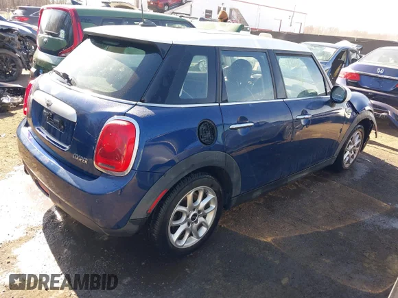 ✅ 2015 MINI Hardtop 4 Door • VIN: WMWXS5C57FT827124 • Лот: 41806392. Опубліковано раніше на IAAI з пробігом 114 110 миль. Безкоштовний доступ до архіву аукціонних продажів зі США та докладний звіт про історію автомобіля на DreamBid. Зображення 4.