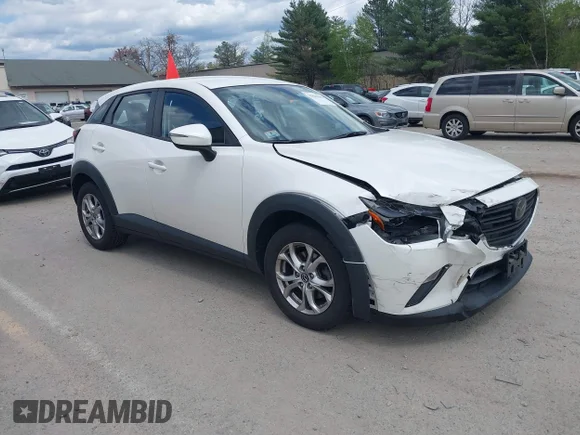 ✅ 2021 Mazda CX-3 Sport • VIN: JM1DKFB72M1506101 • Lot: 45061646. Listed on IAAI with 57,238 mi. Free auction sales archive from the USA and detailed vehicle history report at DreamBid. Image 1.