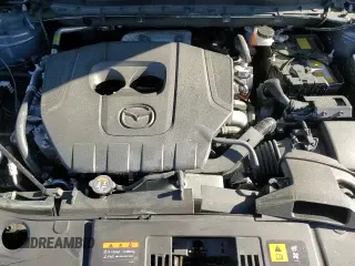 ✅ 2025 Mazda CX-5 S Carbon Edition • VIN: JM3KFBCM3S0675028 • Лот: 90024635. Опубликован ранее на Copart с пробегом 10 428 миль. Бесплатный доступ к архиву аукционных продаж из США и подробный отчёт об истории автомобиля на DreamBid. Изображение 14.