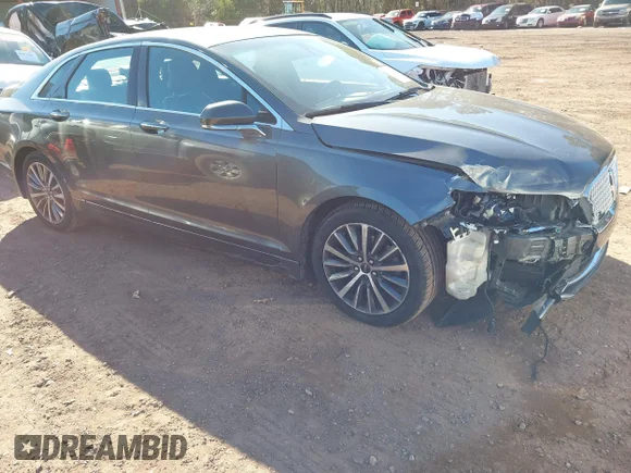 ✅ 2019 Lincoln MKZ Standard • VIN: 3LN6L5A91KR618759 • Lot: 41154325. Wystawiony na IAAI z przebiegiem 125 289 mil. Bezpłatny archiwum sprzedaży aukcyjnych z USA i szczegółowy raport historii pojazdu na DreamBid. Zdjęcie 1.