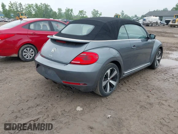 ✅ 2013 Volkswagen Beetle R-Line SEL • VIN: 3VW8T7AT8DM832682 • Lot: 42419453. Wystawiony na IAAI z przebiegiem 79 663 mil. Bezpłatny archiwum sprzedaży aukcyjnych z USA i szczegółowy raport historii pojazdu na DreamBid. Zdjęcie 4.