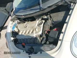 ✅ 2009 Volkswagen Beetle S • VIN: 3VWRF31Y49M409007 • Lot: 41859334. Listed on IAAI with 86,560 mi. Free auction sales archive from the USA and detailed vehicle history report at DreamBid. Image 13.