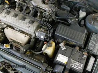 ✅ 1995 Toyota Corolla DX • VIN: JT2AE09B7S0080211 • Lot: 42230935. Listed on IAAI with 112,290 mi. Free auction sales archive from the USA and detailed vehicle history report at DreamBid. Image 12.