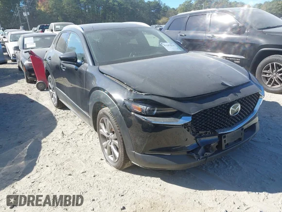 ✅ 2023 Mazda CX-30 S Premium • VIN: 3MVDMBDM2PM527428 • Лот: 43442626. Опубліковано раніше на IAAI з пробігом 51 441 миль. Безкоштовний доступ до архіву аукціонних продажів зі США та докладний звіт про історію автомобіля на DreamBid. Зображення 1.