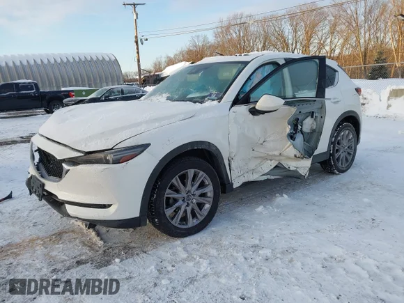 ✅ 2019 Mazda CX-5 Grand Touring • VIN: JM3KFBDMXK0633356 • Лот: 44245501. Опубликован ранее на IAAI с пробегом 96 137 миль. Бесплатный доступ к архиву аукционных продаж из США и подробный отчёт об истории автомобиля на DreamBid. Изображение 2.