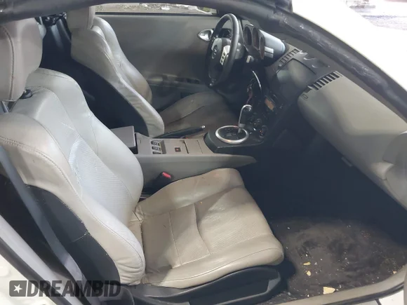 ✅ 2005 Nissan 350Z Touring • VIN: JN1AZ36A95M759518 • Lot: 43262306. Wystawiony na IAAI z przebiegiem 147 199 mil. Bezpłatny archiwum sprzedaży aukcyjnych z USA i szczegółowy raport historii pojazdu na DreamBid. Zdjęcie 5.