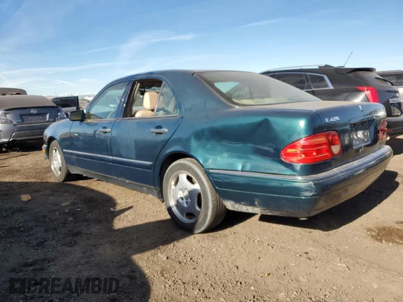 ✅ 1997 Mercedes-Benz E 320 • VIN: WDBJF72F7VA518538 • Лот: 83118824. Опубликован ранее на Copart с пробегом 167 288 миль. Бесплатный доступ к архиву аукционных продаж из США и подробный отчёт об истории автомобиля на DreamBid. Изображение 2.