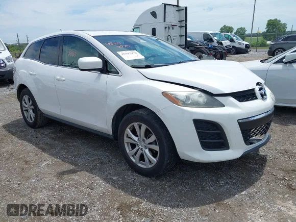 ✅ 2010 Mazda CX-7 Touring • VIN: JM3ER4WL6A0300980 • Lot: 45397970. Listed on IAAI with 147,749 mi. Free auction sales archive from the USA and detailed vehicle history report at DreamBid. Image 1.