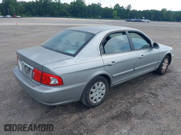 ✅ 2003 Kia Optima LX • VIN: KNAGD126935202463 • Lot: 45545688. Wystawiony na IAAI z przebiegiem 207 032 mil. Bezpłatny archiwum sprzedaży aukcyjnych z USA i szczegółowy raport historii pojazdu na DreamBid. Zdjęcie 4.