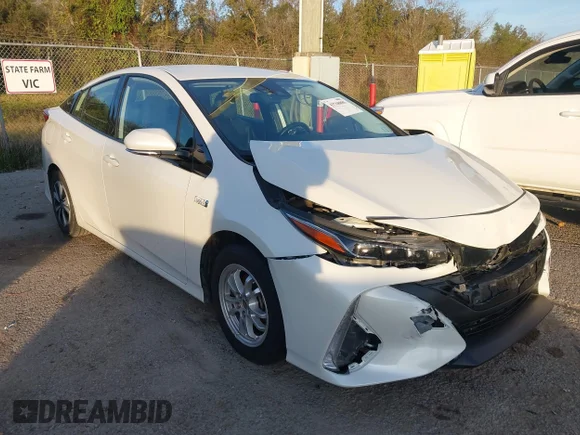 ✅ 2020 Toyota Prius LE • VIN: JTDKARFP2L3141556 • Lot: 43768885. Listed on IAAI with 67,232 mi. Free auction sales archive from the USA and detailed vehicle history report at DreamBid. Image 1.