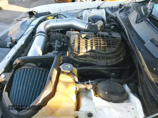 ✅ 2013 Dodge Challenger SXT • VIN: 2C3CDYAG8DH582012 • Lot: 43634202. Listed on IAAI with 141,359 mi. Free auction sales archive from the USA and detailed vehicle history report at DreamBid. Image 19.