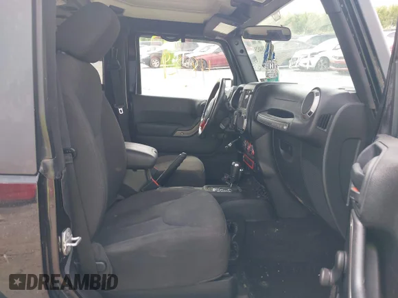 ✅ 2015 Jeep Wrangler Sport • VIN: 1C4AJWAG6FL653522 • Lot: 43184829. Wystawiony na IAAI z przebiegiem 135 465 mil. Bezpłatny archiwum sprzedaży aukcyjnych z USA i szczegółowy raport historii pojazdu na DreamBid. Zdjęcie 5.
