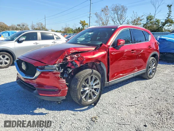 ✅ 2019 Mazda CX-5 Signature • VIN: JM3KFBEY4K0560664 • Лот: 76872695. Опубліковано раніше на Copart з пробігом 65 436 миль. Безкоштовний доступ до архіву аукціонних продажів зі США та докладний звіт про історію автомобіля на DreamBid. Зображення 1.