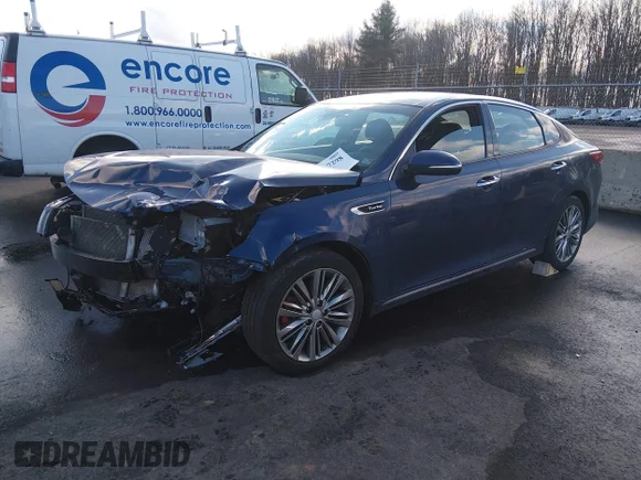 ✅ 2018 Kia Optima SX • VIN: 5XXGV4L25JG202482 • Lot: 44167298. Wystawiony na IAAI z przebiegiem 141 949 mil. Bezpłatny archiwum sprzedaży aukcyjnych z USA i szczegółowy raport historii pojazdu na DreamBid. Zdjęcie 2.