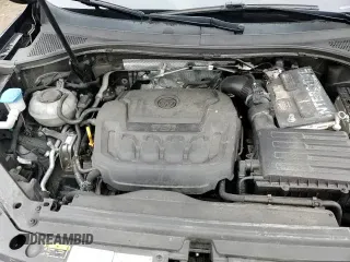 ✅ 2021 Volkswagen Tiguan SE • VIN: 3VV2B7AX1MM067735 • Lot: 86079125. Listed on Copart with 83,584 mi. Free auction sales archive from the USA and detailed vehicle history report at DreamBid. Image 14.