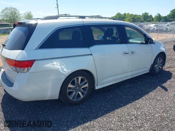 ✅ 2014 Honda Odyssey Touring • VIN: 5FNRL5H93EB107230 • Лот: 44939817. Опубліковано раніше на IAAI з пробігом 325 394 миль. Безкоштовний доступ до архіву аукціонних продажів зі США та докладний звіт про історію автомобіля на DreamBid. Зображення 4.