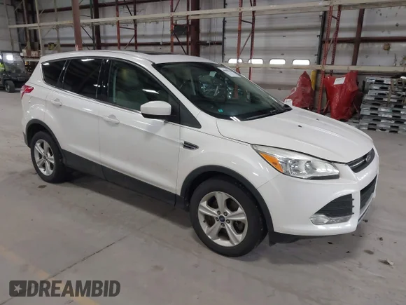 ✅ 2014 Ford Escape SE • VIN: 1FMCU9GX9EUA21983 • Lot: 44688438. Listed on IAAI with 202,174 mi. Free auction sales archive from the USA and detailed vehicle history report at DreamBid. Image 1.
