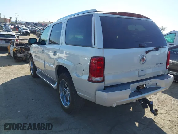 ✅ 2005 Cadillac Escalade • VIN: 1GYEK63N35R204279 • Lot: 41634388. Wystawiony na IAAI z przebiegiem 106 791 mil. Bezpłatny archiwum sprzedaży aukcyjnych z USA i szczegółowy raport historii pojazdu na DreamBid. Zdjęcie 3.