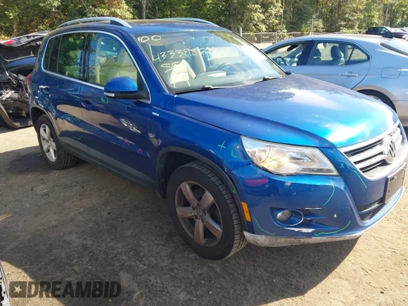 ✅ 2010 Volkswagen Tiguan • VIN: WVGAV9AXXAW003911 • Lot: 43339863. Listed on IAAI with 86,869 mi. Free auction sales archive from the USA and detailed vehicle history report at DreamBid. Image 1.