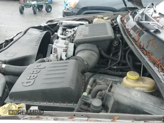 ✅ 1999 Jeep Grand Cherokee Limited • VIN: 1J4GW68N4XC705158 • Лот: 43712573. Опубликован ранее на IAAI с пробегом 251 619 миль. Бесплатный доступ к архиву аукционных продаж из США и подробный отчёт об истории автомобиля на DreamBid. Изображение 13.