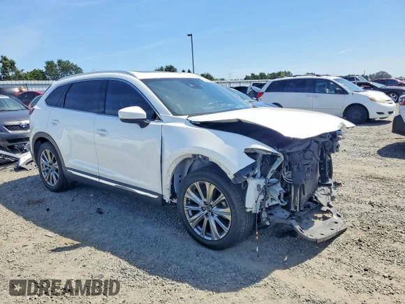✅ 2022 Mazda CX-9 Signature • VIN: JM3TCBEY9N0612842 • Lot: 55912436. Listed on Copart with 86,430 mi. Free auction sales archive from the USA and detailed vehicle history report at DreamBid. Image 4.