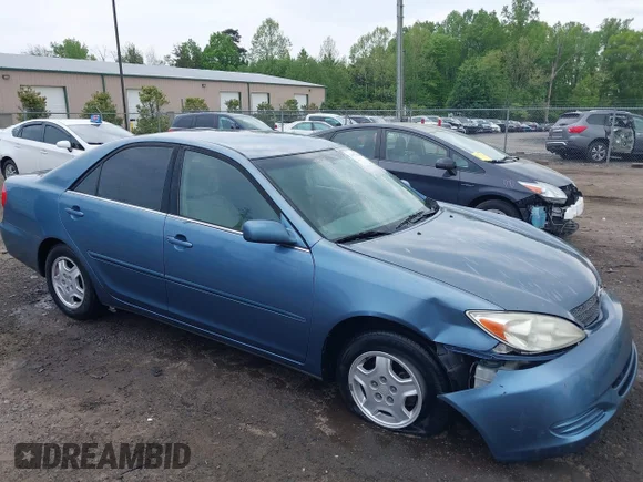 ✅ 2002 Toyota Camry LE • VIN: 4T1BF32K02U518382 • Lot: 42112326. Listed on IAAI with 248,178 mi. Free auction sales archive from the USA and detailed vehicle history report at DreamBid. Image 1.