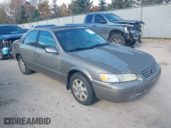 ✅ 1999 Toyota Camry XLE • VIN: JT2BF28K8X0185121 • Lot: 43554546. Listed on IAAI with 280,637 mi. Free auction sales archive from the USA and detailed vehicle history report at DreamBid. Image 1.