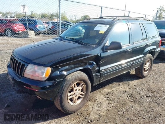 ✅ 2000 Jeep Grand Cherokee Limited • VIN: 1J4GW58N5YC137157 • Lot: 43327384. Wystawiony na IAAI z przebiegiem 249 755 mil. Bezpłatny archiwum sprzedaży aukcyjnych z USA i szczegółowy raport historii pojazdu na DreamBid. Zdjęcie 2.