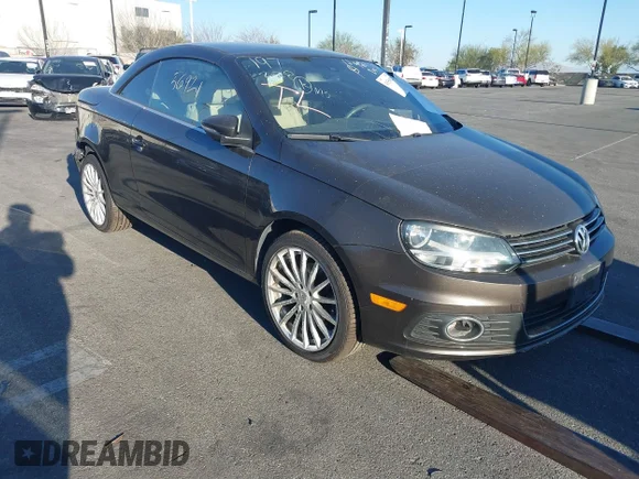 ✅ 2012 Volkswagen Eos Executive • VIN: WVWFW7AHXCV000617 • Lot: 41556921. Listed on IAAI with 68,621 mi. Free auction sales archive from the USA and detailed vehicle history report at DreamBid. Image 1.