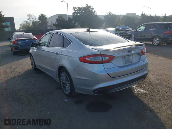 ✅ 2014 Ford Fusion Titanium • VIN: 3FA6P0K9XER152446 • Lot: 43944711. Wystawiony na IAAI z przebiegiem 100 863 mil. Bezpłatny archiwum sprzedaży aukcyjnych z USA i szczegółowy raport historii pojazdu na DreamBid. Zdjęcie 3.