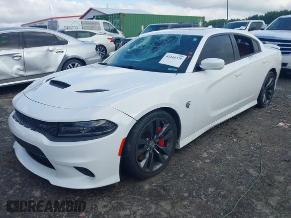 ✅ 2015 Dodge Charger SRT Hellcat • VIN: 2C3CDXL99FH836323 • Lot: 42445379. Listed on IAAI with 26,791 mi. Free auction sales archive from the USA and detailed vehicle history report at DreamBid. Image 2.