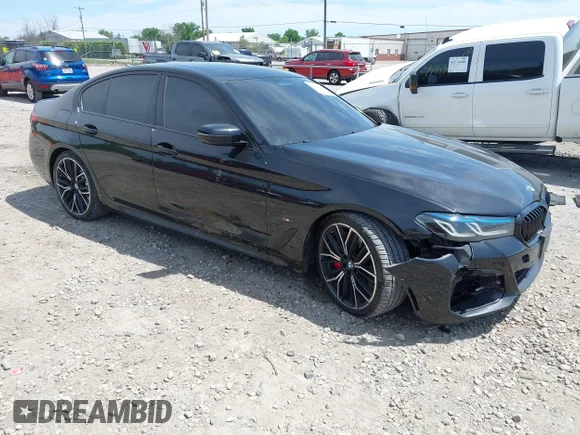✅ 2022 BMW 5 Series M550i xDrive • VIN: WBA13BK09NCK21703 • Лот: 45275751. Опубліковано раніше на IAAI з пробігом 58 691 миль. Безкоштовний доступ до архіву аукціонних продажів зі США та докладний звіт про історію автомобіля на DreamBid. Зображення 1.