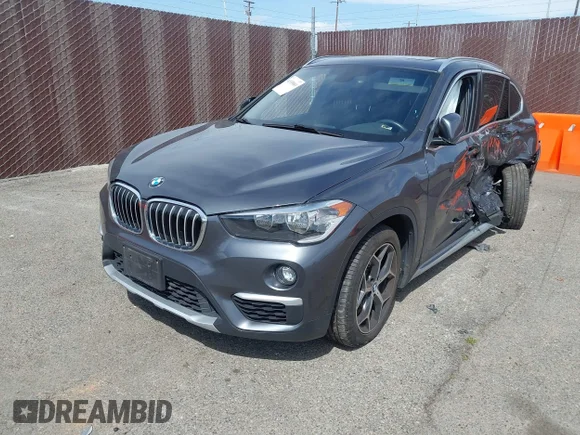 ✅ 2018 BMW X1 xDrive28i • VIN: WBXHT3C30J5L34702 • Лот: 41935803. Опубликован ранее на IAAI с пробегом 42 174 миль. Бесплатный доступ к архиву аукционных продаж из США и подробный отчёт об истории автомобиля на DreamBid. Изображение 2.