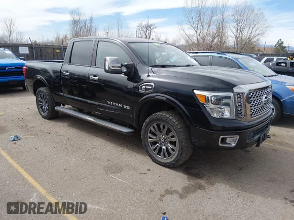 ✅ 2016 Nissan Titan Platinum Reserve • VIN: 1N6BA1F49GN500996 • Lot: 44597993. Listed on IAAI with 95,634 mi. Free auction sales archive from the USA and detailed vehicle history report at DreamBid. Image 1.