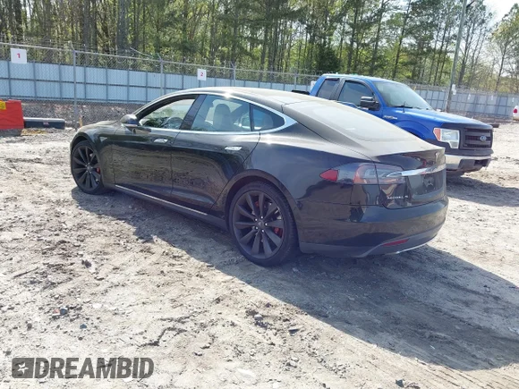 ✅ 2015 Tesla Model S 85 • VIN: 5YJSA1S11FFP79033 • Lot: 41924740. Listed on IAAI with 118,851 mi. Free auction sales archive from the USA and detailed vehicle history report at DreamBid. Image 3.