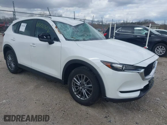 ✅ 2018 Mazda CX-5 Sport • VIN: JM3KFBBM3J0385677 • Lot: 44782506. Listed on IAAI with 58,200 mi. Free auction sales archive from the USA and detailed vehicle history report at DreamBid. Image 1.