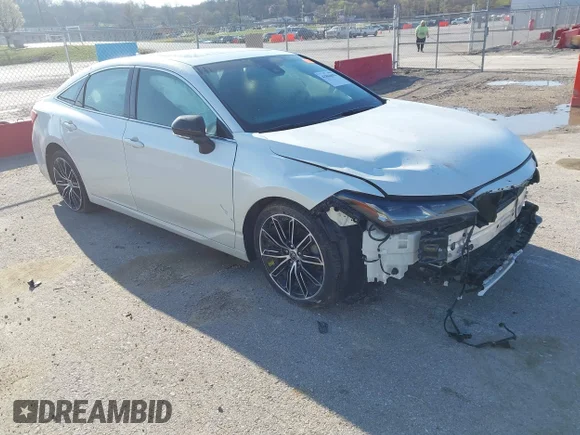 ✅ 2022 Toyota Avalon Touring • VIN: 4T1HZ1FB9NU081762 • Лот: 41864696. Опубліковано раніше на IAAI з пробігом 55 647 миль. Безкоштовний доступ до архіву аукціонних продажів зі США та докладний звіт про історію автомобіля на DreamBid. Зображення 1.