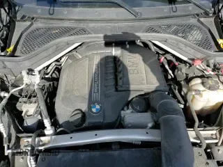 ✅ 2018 BMW X5 xDrive35i • VIN: 5UXKR0C50JL071526 • Lot: 90234015. Listed on Copart with 132,295 mi. Free auction sales archive from the USA and detailed vehicle history report at DreamBid. Image 14.