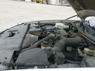 ✅ 2000 Lincoln Town Car Executive • VIN: 1LNHM81W1YY933309 • Lot: 43632633. Wystawiony na IAAI z przebiegiem 171 926 mil. Bezpłatny archiwum sprzedaży aukcyjnych z USA i szczegółowy raport historii pojazdu na DreamBid. Zdjęcie 19.