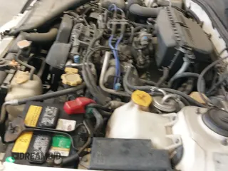 ✅ 2000 Subaru Legacy • VIN: 4S3BE645XY7215438 • Lot: 42319359. Listed on IAAI with 161,009 mi. Free auction sales archive from the USA and detailed vehicle history report at DreamBid. Image 12.