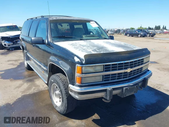 ✅ 1992 Chevrolet Suburban • VIN: 1GNGK26K5NJ322123 • Lot: 44791574. Wystawiony na IAAI z przebiegiem 122 438 mil. Bezpłatny archiwum sprzedaży aukcyjnych z USA i szczegółowy raport historii pojazdu na DreamBid. Zdjęcie 1.