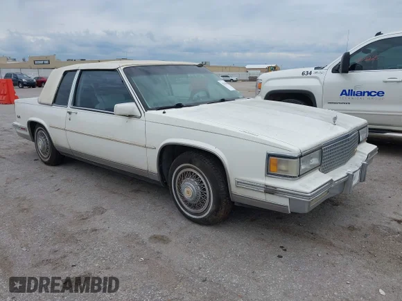 ✅ 1988 Cadillac DeVille • VIN: 1G6CD1156J4269375 • Лот: 42203004. Опубликован ранее на IAAI с пробегом 154 782 миль. Бесплатный доступ к архиву аукционных продаж из США и подробный отчёт об истории автомобиля на DreamBid. Изображение 1.