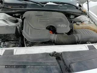 ✅ 2017 Dodge Challenger SXT Plus • VIN: 2C3CDZAG4HH568829 • Lot: 92440265. Listed on Copart with 128,865 mi. Free auction sales archive from the USA and detailed vehicle history report at DreamBid. Image 13.