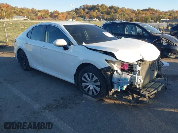 ✅ 2023 Toyota Camry Hybrid LE • VIN: 4T1C31AK9PU607023 • Lot: 43638161. Listed on IAAI with 91,983 mi. Free auction sales archive from the USA and detailed vehicle history report at DreamBid. Image 1.