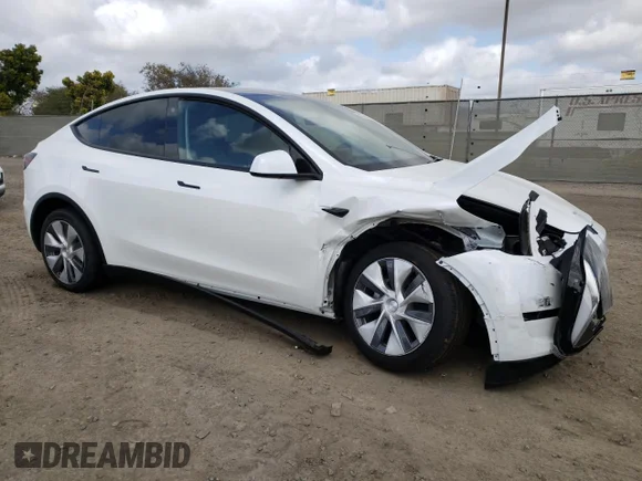 ✅ 2023 Tesla Model Y Long Range • VIN: 7SAYGDEE7PA069337 • Лот: 46934293. Опубліковано раніше на Copart з пробігом 986 миль. Безкоштовний доступ до архіву аукціонних продажів зі США та докладний звіт про історію автомобіля на DreamBid. Зображення 4.