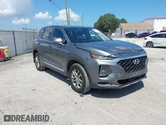 ✅ 2020 Hyundai Santa Fe SE • VIN: 5NMS23AD0LH141287 • Лот: 45568185. Опубліковано раніше на IAAI з пробігом 135 399 миль. Безкоштовний доступ до архіву аукціонних продажів зі США та докладний звіт про історію автомобіля на DreamBid. Зображення 1.