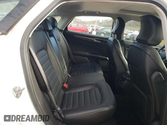 ✅ 2015 Ford Fusion SE Hybrid • VIN: 3FA6P0LU2FR172162 • Lot: 42200053. Wystawiony na Copart z przebiegiem 227 797 mil. Bezpłatny archiwum sprzedaży aukcyjnych z USA i szczegółowy raport historii pojazdu na DreamBid. Zdjęcie 10.