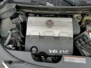 ✅ 2010 Cadillac SRX Premium Collection • VIN: 3GYFNFEY2AS606370 • Lot: 83405774. Wystawiony na Copart z przebiegiem 164 238 mil. Bezpłatny archiwum sprzedaży aukcyjnych z USA i szczegółowy raport historii pojazdu na DreamBid. Zdjęcie 14.